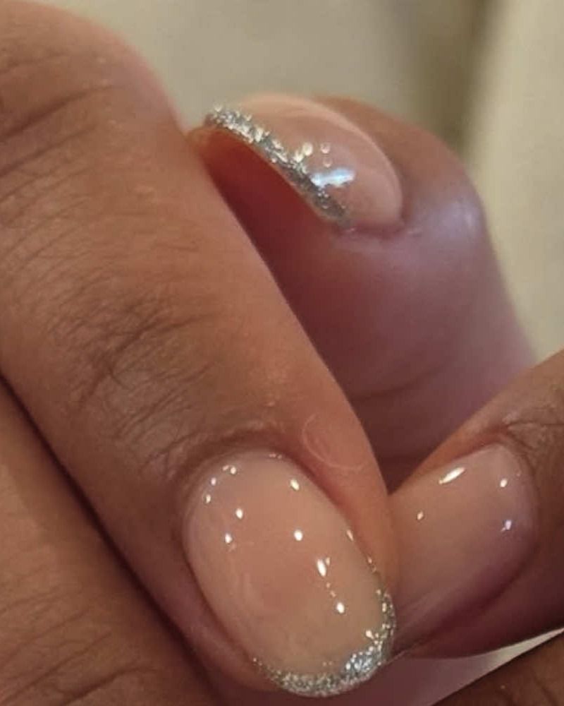Nude gel with silver French tips