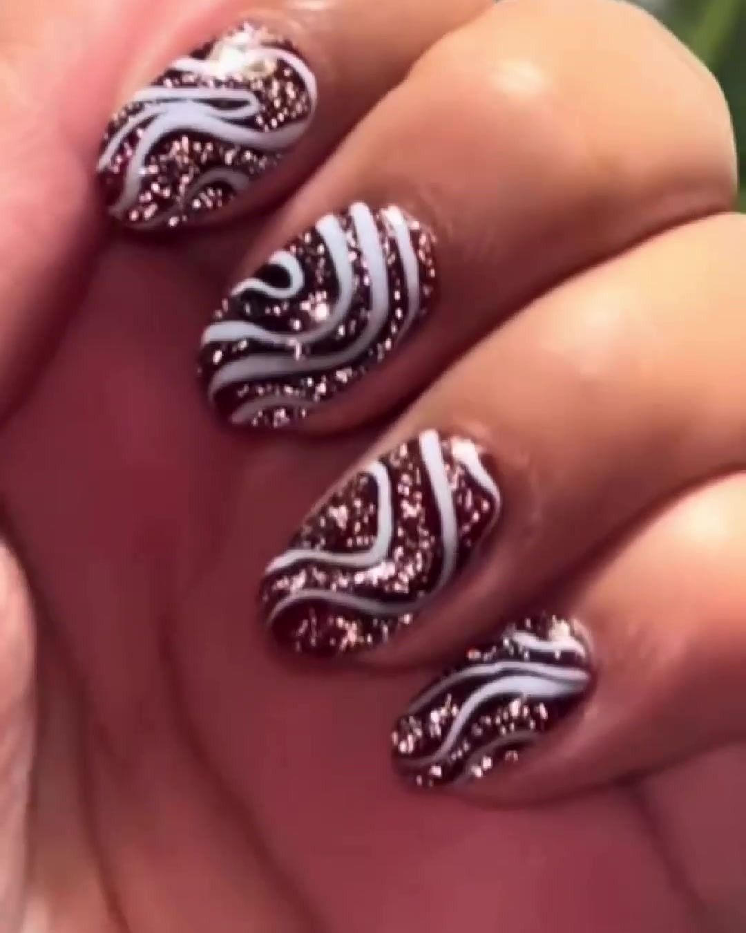 Glitter swirl nail art